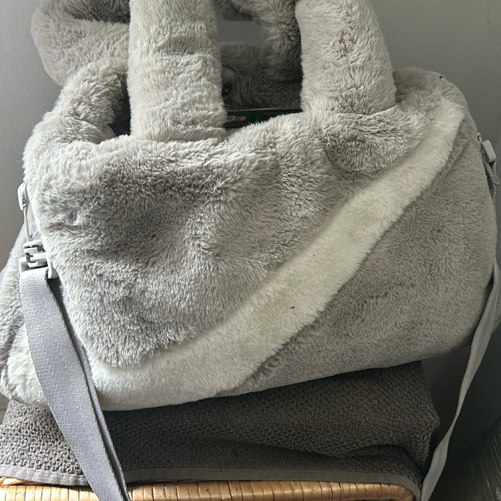 Nike faux fur purse